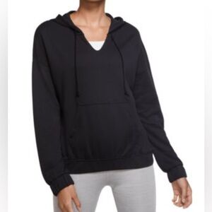 Nike Yoga Dry-FIT Cover-Up Hoodie relaxed fit v neck opening.